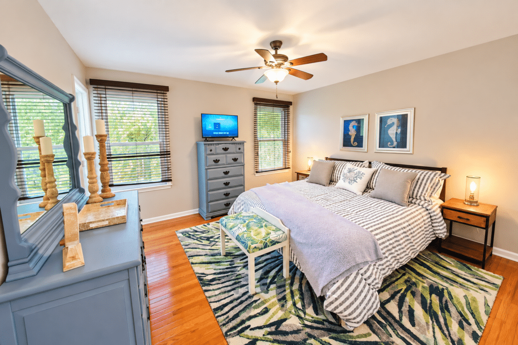Bright Coastal Bedroom with Seahorse Art