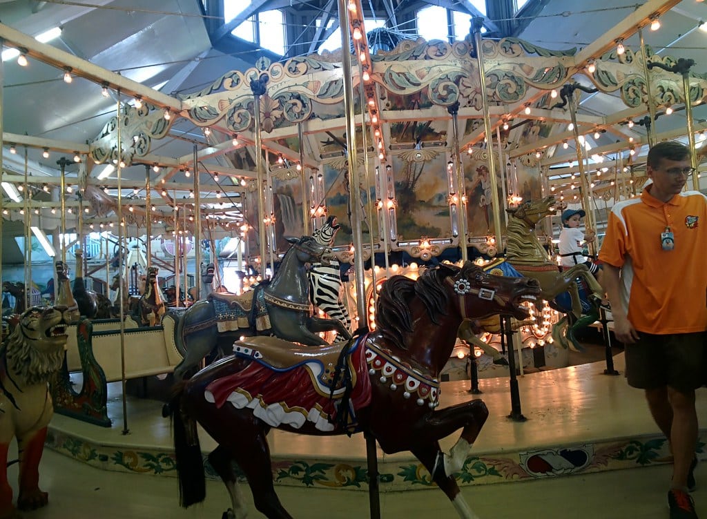 Historic hand-carved carousel lit up inside Trimper Rides on the Ocean City boardwalk